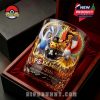 Commemorative glass featuring Pokémon anniversary artwork inside a collector’s gift box, highlighting vibrant legendary characters and golden details!