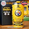 A Stanley and Pittsburgh Steelers collaboration tumbler with bold yellow color, team emblem, and collector’s packaging shown on a wooden table.