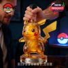 Person adjusting Pikachu bottle with lightning effects for Pokémon's 30th Anniversary.