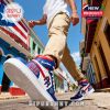Custom Puerto Rico high-top sneakers in motion on a vibrant city street, featuring name personalization and national color scheme.