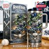 Rat Fink Yankees tumbler and box with hot rod and baseball art on tabletop with team gear nearby!