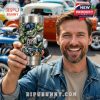 Smiling man holding Rat Fink Yankees tumbler in front of colorful classic cars at outdoor event!