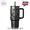 Metal tumbler with handle featuring an eagle with wings, letter 'D', song lyrics, and musical notes design.!