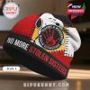 Beanie featuring Snoopy, red hand print, and text 'No More Stolen Sisters'.!