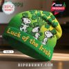 Snoopy wearing a green St. Patrick's Day hat on a cozy beanie.