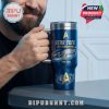A man holding a blue Star Trek 60th Anniversary tumbler with metallic finish and space-themed artwork, featuring the USS Enterprise and Starfleet insignia.