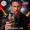 Iron Maiden commemorative tumbler with handle held by man in dark leather jacket against intense lightning background!