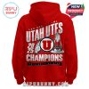 Back design red hoodie showing Utah Utes 2025 Bowl Champions artwork with trophy and logo centerpiece.