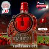 Utah Utes logo-shaped whiskey bottle with red cap and feather design.