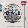 Dallas Cowboys themed wall clock with team merchandise displayed around the clock face.!