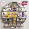 Los Angeles Lakers themed wall clock with team memorabilia like jersey, basketball, scarf, hat and a giraffe figure.!