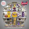 Los Angeles Lakers themed wall clock featuring team merchandise and logos displayed on a metal shelf design.!