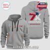 Gray hoodie featuring Super Bowl LVII logo and 'Champions' with the New England Patriots logo and Super Bowl wins in Roman numerals.!