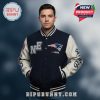Man in Patriots letterman jacket with 'NE' and Patriots logos and text 'Go Pats'.!
