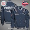 New England Patriots varsity jacket with team logos and the text 'We are all Patriots'.!