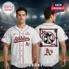 White baseball jersey with 'Athletics' and 'A's' text, plus Bruno Mars illustration on the back.!