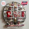 Novelty wall clock featuring Oklahoma Sooners college football theme with memorabilia on shelves.!