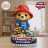 Paddington Bear figurine in red hat, blue coat, holding suitcase. 'Paddington, Off to London!' text on base.!