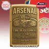 Gold Zippo lighter featuring the Arsenal logo, stadium, and the text 