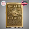 Gold lighter featuring Real Madrid logo, stadium, and 'Hala Madrid' text.!