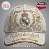 White cap featuring the Real Madrid logo, laurel leaves, crown, and '1902-2026 124TH ANNIVERSARY' text.!