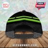 The back of a black baseball cap features green stripes and a polka dot pattern.!
