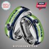Two metal rings with Seattle Seahawks Super Bowl LX Champions design and 'Emerald City' engraving inside.!