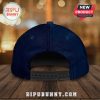 Back view of a blue denim cap with a black adjustable strap. New product tag visible.!