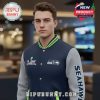 Man in jacket with Seattle Seahawks logo, Super Bowl patch. 'Seahawks' text on sleeve.!