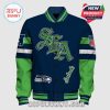 Letterman jacket with SEA text, Seahawks logo, NFL logo. Blue jacket with green sleeves.!
