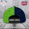 Back view of a two-tone hat, green on the left and blue on the right, with a black adjustable strap.!