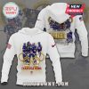 White hoodie featuring the USA Women's Hockey team celebrating their Olympic win with golden rings graphic.!