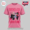 Pink tee: 'EVERYONE'S A STAR 5 SECONDS OF SUMMER'. Band cartoon graphic. Cool merch!