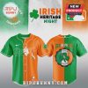 Irish Heritage Night baseball jersey! Green and orange split, 'Dodgers' script, shamrock, 'Irish Pride' text. Shop now!