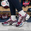 Burgundy sneakers featuring the Colorado Avalanche logo and a customizable name, shown in a locker room setting!