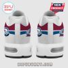 White sneakers showing a burgundy stripe, blue stripe, and Colorado Avalanche logo!
