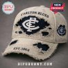 Carlton Blues hat: distressed beige, navy logo, text. 'Est 1864'. Vintage look!