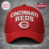 Red baseball cap with 'Cincinnati Reds' text and logo.!