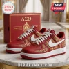 Red Delta Sigma Theta sneakers! Gold accents, white swoosh, sorority letters. Fresh kicks!