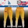 Yellow Demon Slayer joggers featuring the LA Dodgers logo and lightning accents!