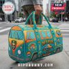 Teal duffel bag with a retro van design, featuring surf and travel themed embellishments and text.!