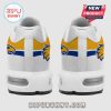 Back view of white sneakers with a blue and gold eagle design.!