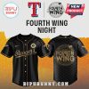 Black baseball jersey with 'Rangers' in gold script, 'Fourth Wing' logo, red & blue 'T' logo. Perfect baseball merch!