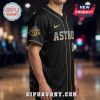 Black baseball jersey. 'ASTRO 0' front, sleeve has 'HARRY STYLES'. Gold accents. Fan apparel!