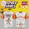 Looney Tunes Astros jersey: white, orange. Features Bugs Bunny, Daffy Duck, and text 'LOONEY TUNES DAY'.!