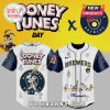 Looney Tunes Day jersey: white, navy, and yellow. Features Bugs Bunny, Brewers logo, and 'Looney Tunes' text!