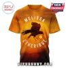 Orange tee shows Raven with the text MELISSA ETHERIDGE in white font!