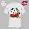 White tee: cartoon racecar, Mickey Mouse, checkered flags. Text: 