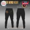 Black patterned sweatpants with 'T' symbol and winged-creature design.!