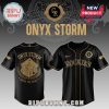 Black/gold baseball jersey with dragon design. Reads: 'Onyx Storm,' 'Brave the Dark,' Rockies logo!